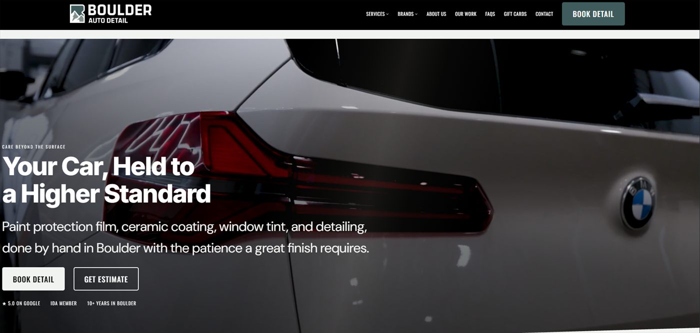 Boulder Auto Detail homepage hero with the headline Your Car, Held to a Higher Standard over a close-up of a car's taillight