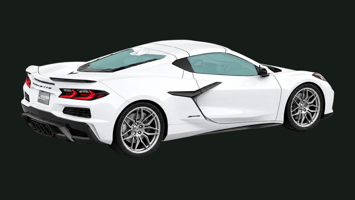 White Corvette, rear three-quarter view, on a dark background